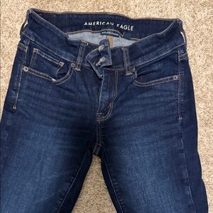 American Eagle Outfitters Women's Deep Indigo Kick Boot Jeans